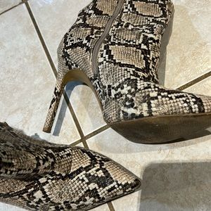 Express snakeskin sexy heeled booties